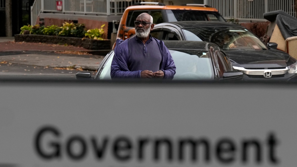Abousfian Abdelrazik makes his way to federal court in Ottawa on Oct. 30, 2024. (Adrian Wyld / The Canadian Press)
