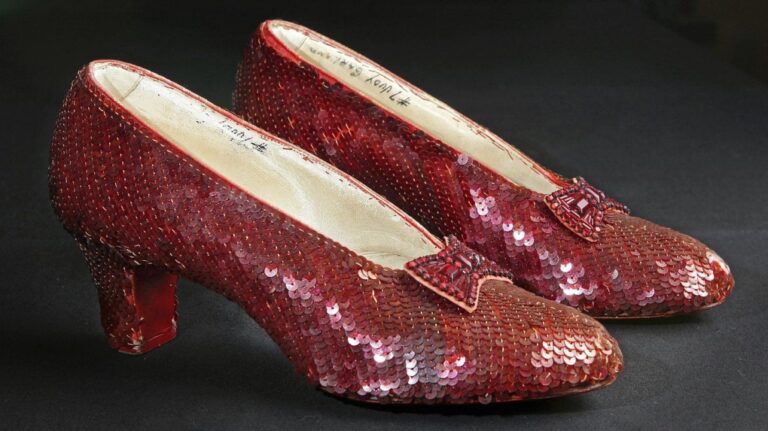 Sequin-covered ruby slippers worn by Judy Garland in "The Wizard of Oz" appear at the offices of Profiles in History in Calabasas, Calif. on Nov. 9, 2001. (AP Photo/Reed Saxon, File)