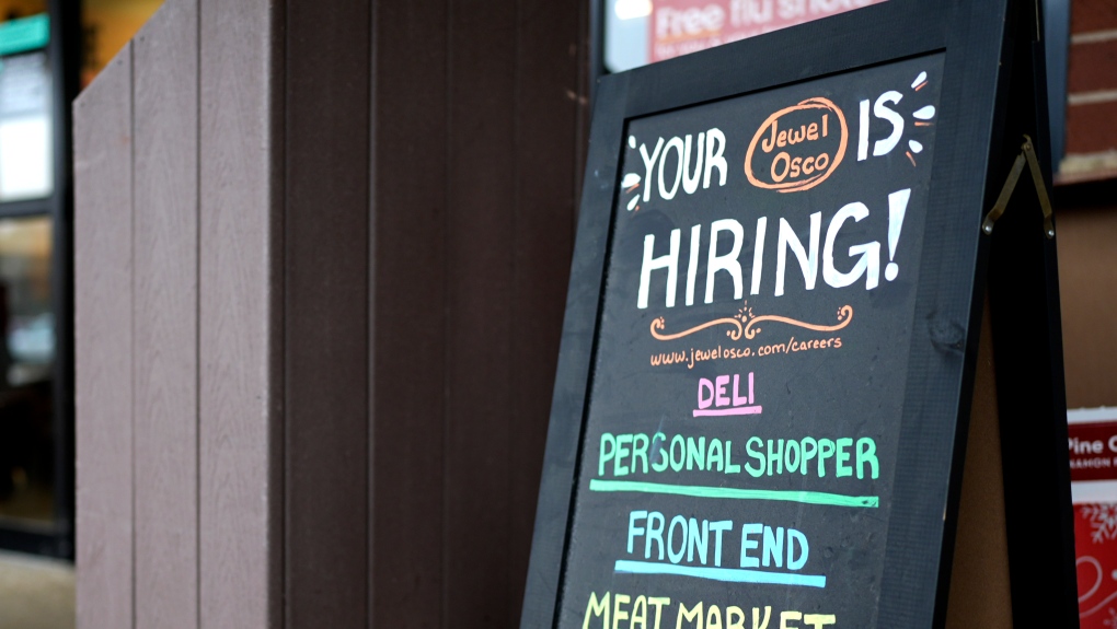 Hiring sign is displayed at a grocery store in Glenview, Ill., Monday, Nov. 25, 2024. (AP Photo/Nam Y. Huh)