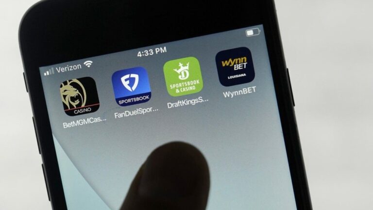 FanDuel, DraftKings and other online gambling apps are displayed on a phone in San Francisco, Sept. 26, 2022. (AP Photo/Jeff Chiu)