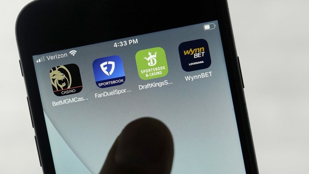 FanDuel, DraftKings and other online gambling apps are displayed on a phone in San Francisco, Sept. 26, 2022. (AP Photo/Jeff Chiu)