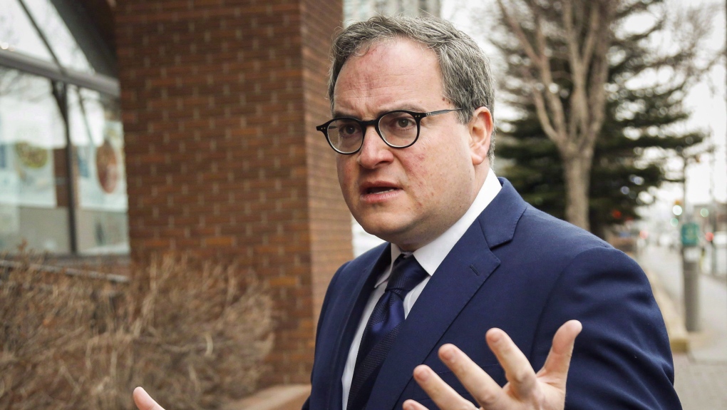 Ezra Levant of Rebel News arrives at the Law Society of Alberta in Calgary, March 2, 2016. THE CANADIAN PRESS/Jeff McIntosh