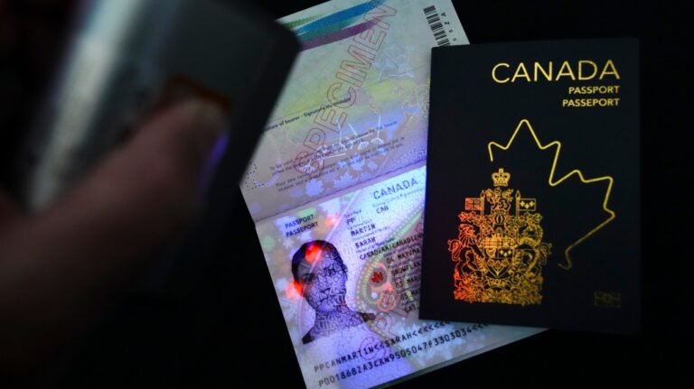 The new Canadian passport is unveiled at an event at the Ottawa International Airport on May 10, 2023. (Sean Kilpatrick / The Canadian Press)