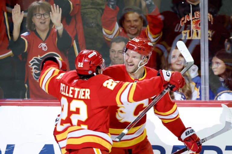 Une soirée de trois points d'Huberdeau aide les Flames à vaincre les Sabres 5-2